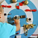 baby activity toy aviator busy board easy busy boards toddler boy playing with an activity board