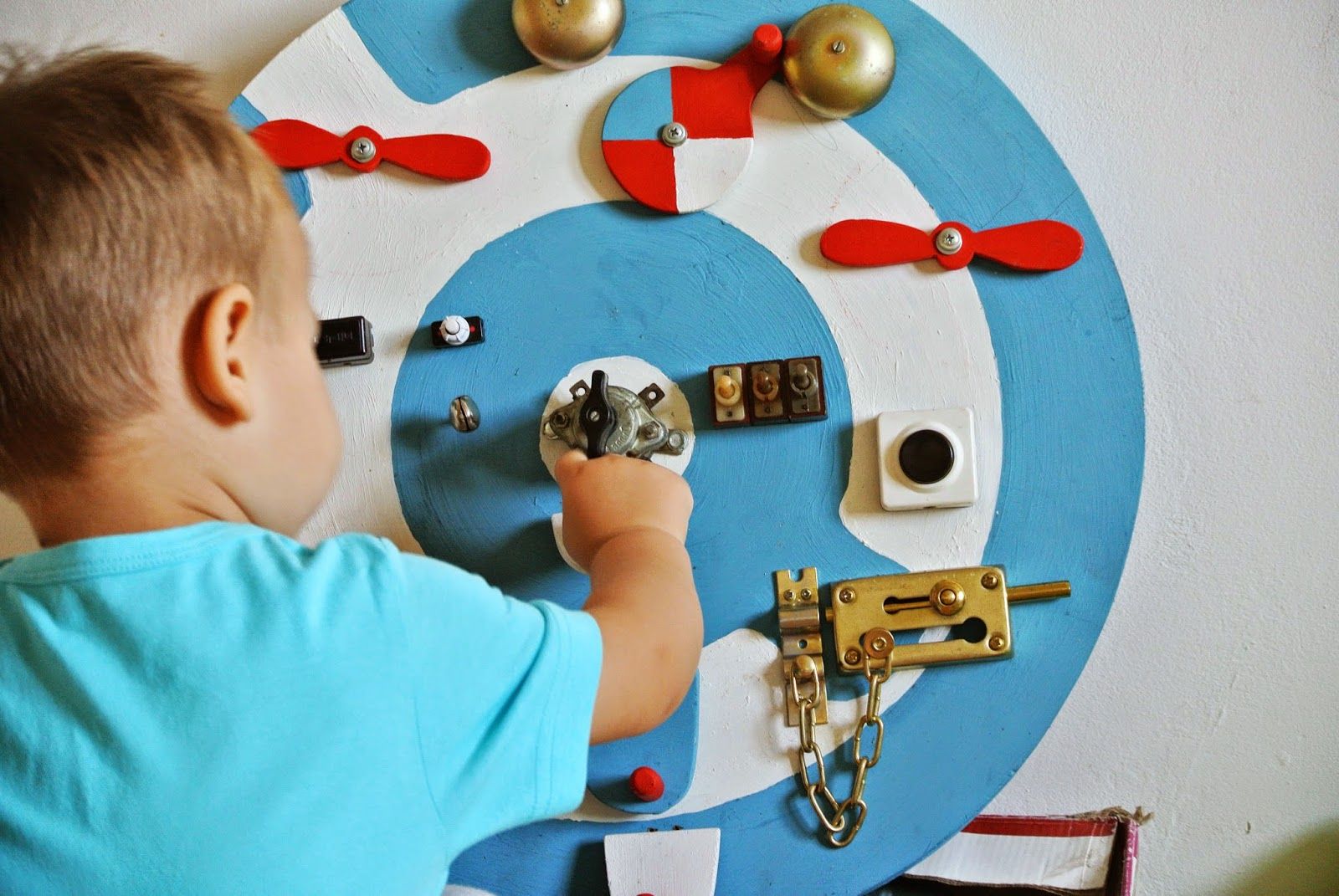 baby activity toy aviator busy board easy busy boards toddler boy playing with an activity board