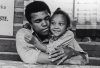 Mohammad Ali with his daughter - best quotes about children